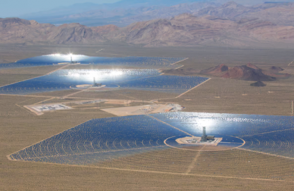 At each of the three towers at Ivanpah, heat from mirrors concentrating sunlight is focused up to a solar receiver. Water transfers the heat to a steam cycle power block at each base.